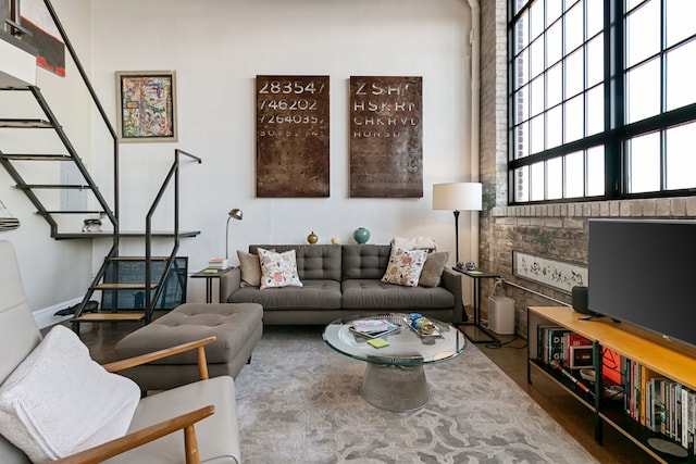 3434 Russell St Unit 28-205, Detroit, MI 48207 - living room featuring wood finished floors