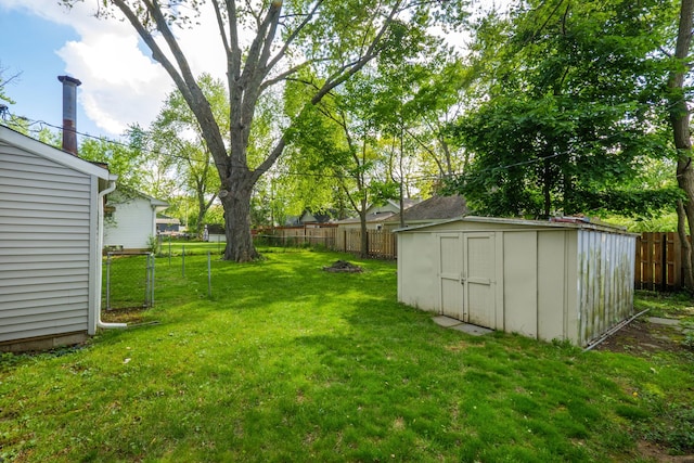 4120 Bunker Ave, West Bloomfield, MI 48323 - view of yard with a storage unit and an outbuilding