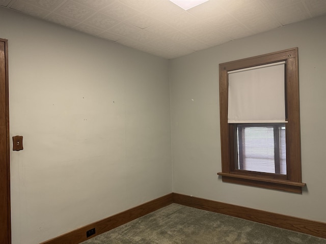 1627 S M-52 Hwy, Owosso, MI 48867 - empty room with dark colored carpet and baseboards