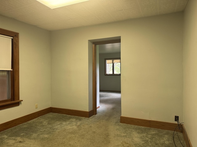 1627 S M-52 Hwy, Owosso, MI 48867 - carpeted empty room with baseboards