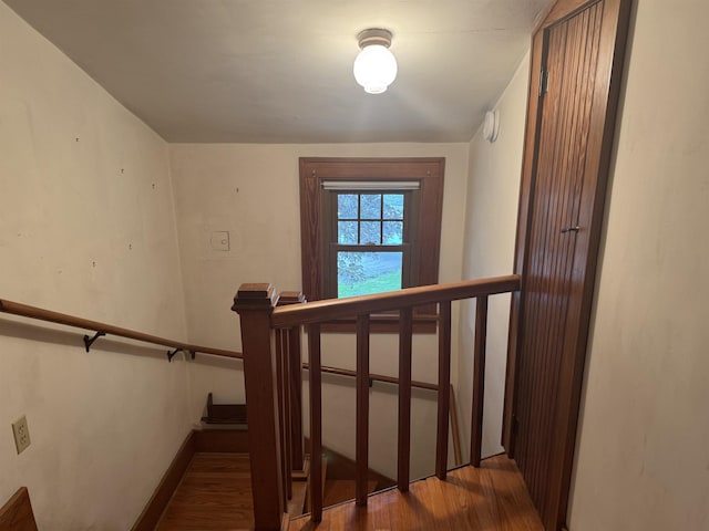 1627 S M-52 Hwy, Owosso, MI 48867 - staircase with wood finished floors and baseboards