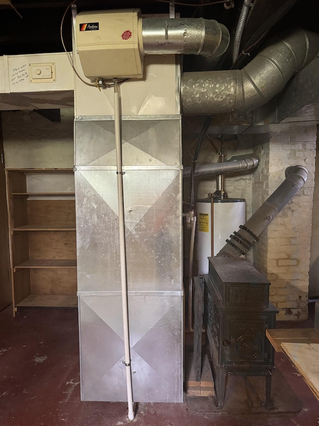 1627 S M-52 Hwy, Owosso, MI 48867 - utility room featuring water heater