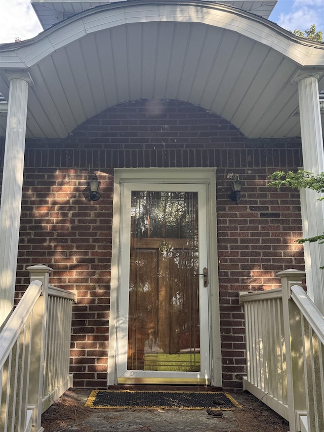 1627 S M-52 Hwy, Owosso, MI 48867 - entrance to property featuring brick siding