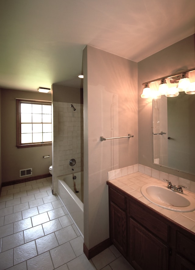 23049 27 Mile Rd, Ray, MI 48096 - full bath with toilet, vanity, tile patterned floors, and tub / shower combination
