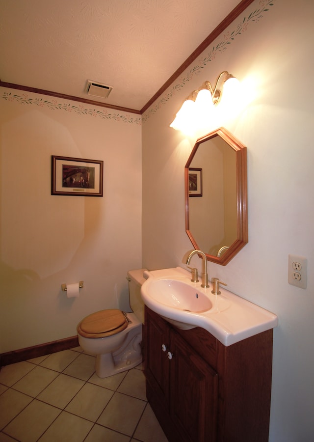 23049 27 Mile Rd, Ray, MI 48096 - half bath featuring vanity, toilet, tile patterned flooring, and baseboards