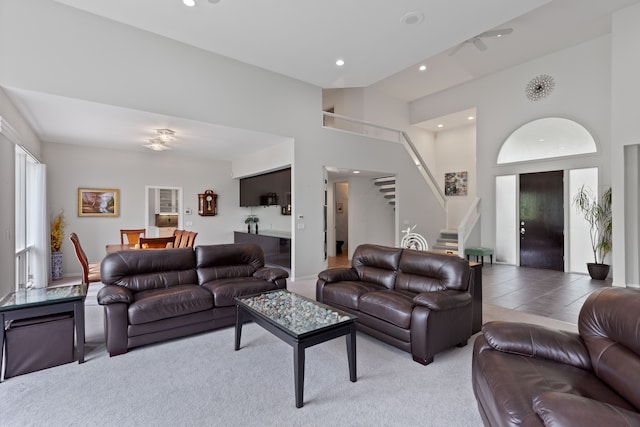 4958 Countryside Dr, West Bloomfield, MI 48323 - living room with stairs, a towering ceiling, and recessed lighting