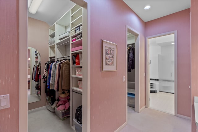 4958 Countryside Dr, West Bloomfield, MI 48323 - walk in closet featuring carpet flooring and arched walkways