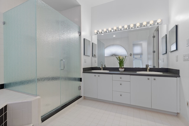 4958 Countryside Dr, West Bloomfield, MI 48323 - full bath featuring a shower stall, double vanity, and tile patterned floors