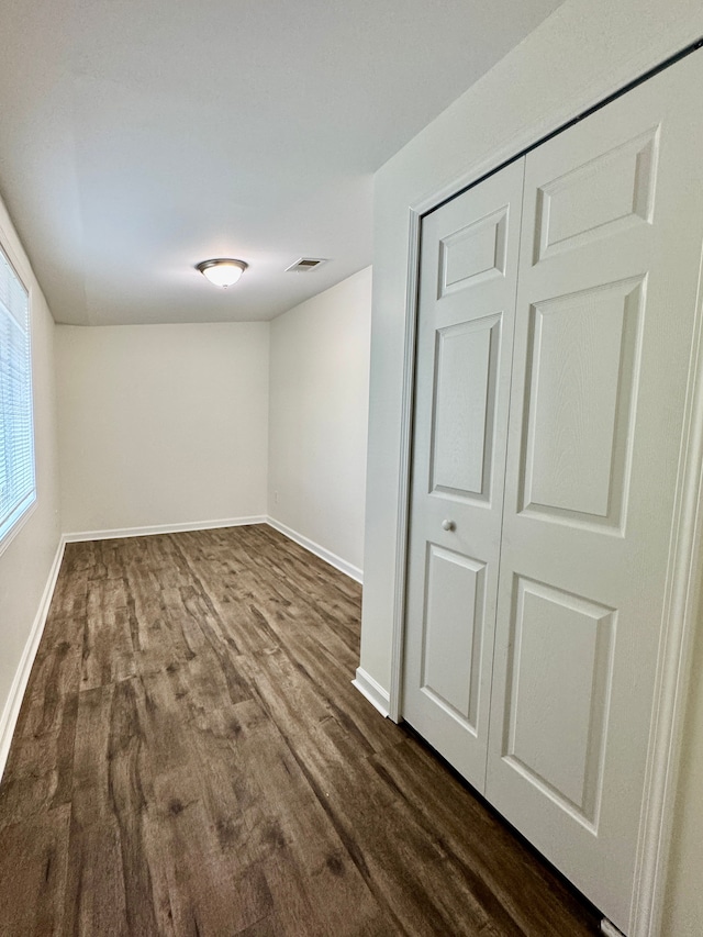 4915 Clarkston Rd, Clarkston, MI 48348 - unfurnished room featuring baseboards and dark wood finished floors