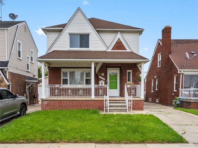 6010 Hartwell St, Dearborn, MI 48126 - view of front of property with a porch, a front yard, brick siding, and roof with shingles