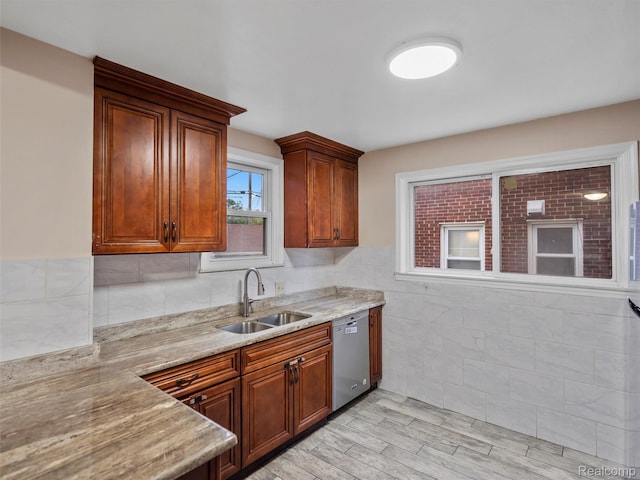 6010 Hartwell St, Dearborn, MI 48126 - kitchen with dishwasher, a sink, light wood finished floors, and light stone counters