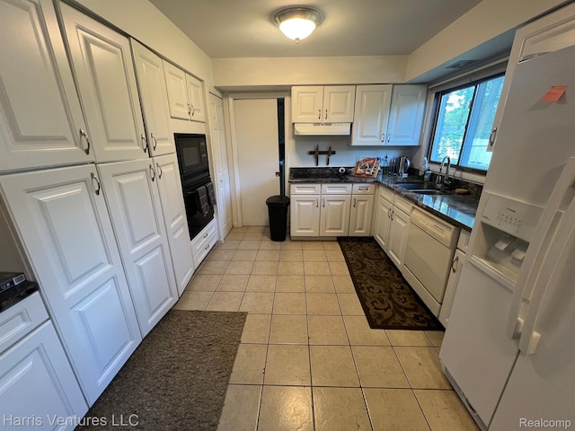 29430 Marimoor Dr, Southfield, MI 48076 - kitchen with black appliances, a sink, under cabinet range hood, dark countertops, and white cabinetry