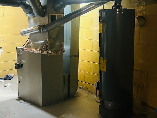 11329 Minock St, Detroit, MI 48228 - utility room featuring water heater and heating unit