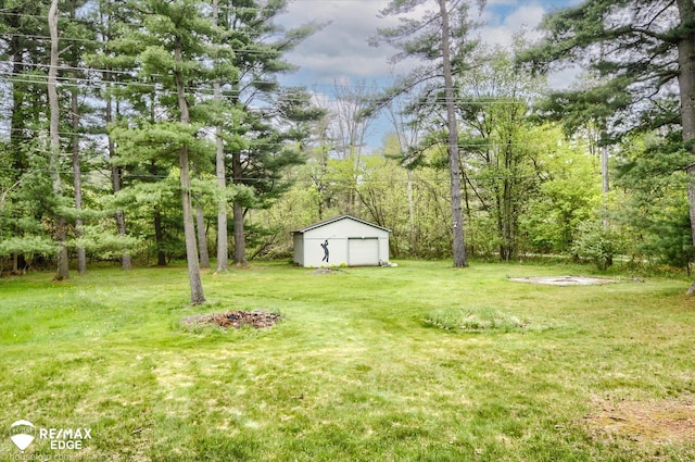 500 Granger Rd, Ortonville, MI 48462 - view of green lawn with an outdoor structure