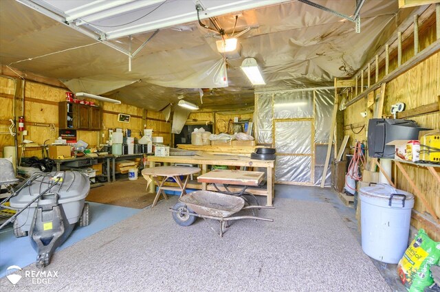 500 Granger Rd, Ortonville, MI 48462 - garage featuring a workshop area