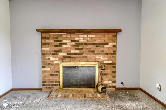 500 Granger Rd, Ortonville, MI 48462 - detailed view of a brick fireplace, carpet floors, and baseboards