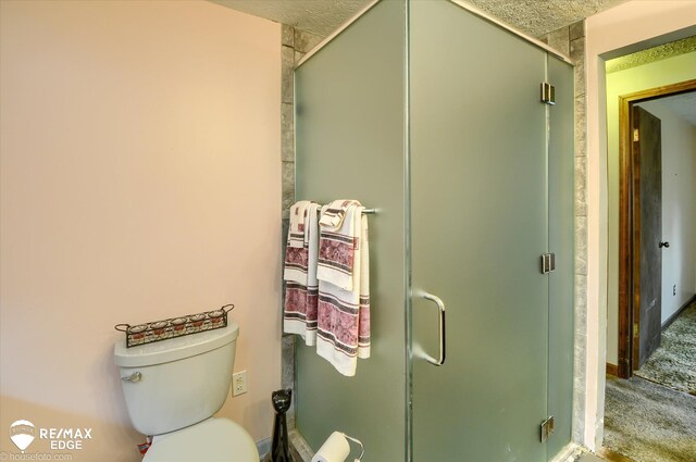 500 Granger Rd, Ortonville, MI 48462 - bathroom featuring a shower stall and toilet