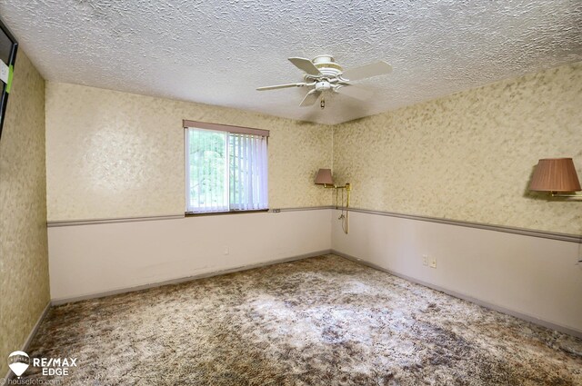 500 Granger Rd, Ortonville, MI 48462 - carpeted empty room with ceiling fan and a textured ceiling