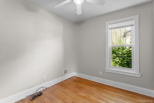 7501 Dunedin St, Detroit, MI 48206 - empty room featuring baseboards, a ceiling fan, and light wood finished floors