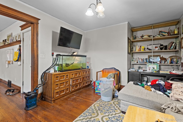 7501 Dunedin St, Detroit, MI 48206 - living room featuring crown molding, wood finished floors, and a chandelier