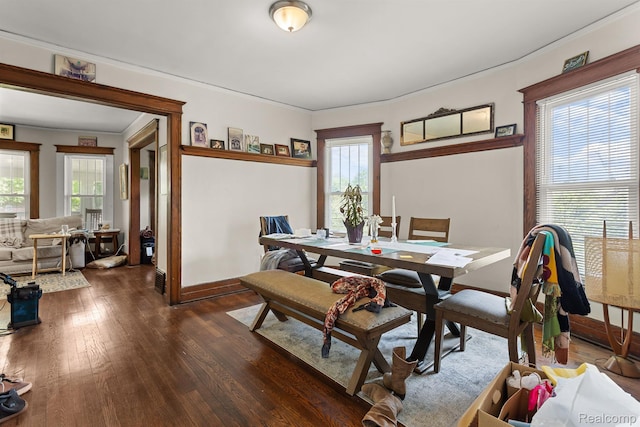 7501 Dunedin St, Detroit, MI 48206 - dining room with dark wood-style floors, plenty of natural light, baseboards, and ornamental molding