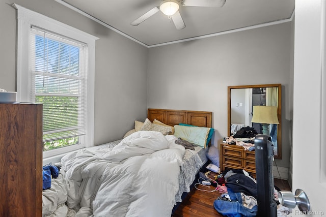 7501 Dunedin St, Detroit, MI 48206 - bedroom with crown molding, ceiling fan, and wood finished floors