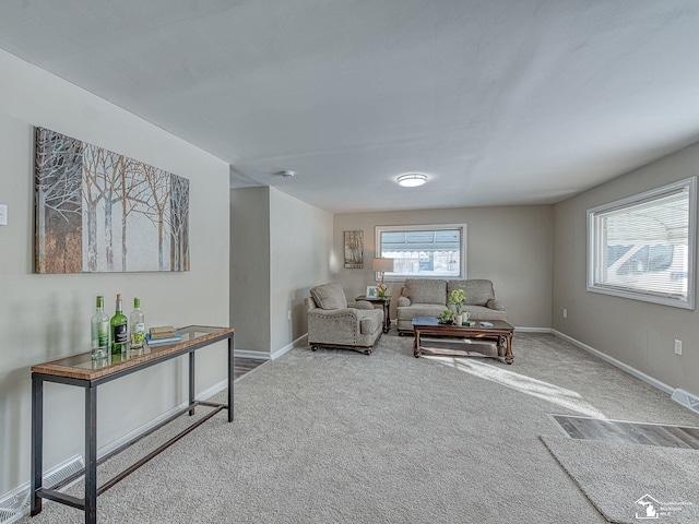 19106 Sylvia Ave, Romulus, MI 48174 - carpeted living room with baseboards