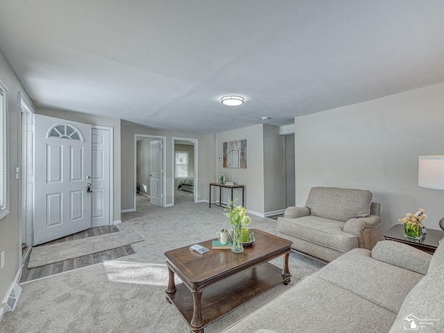 19106 Sylvia Ave, Romulus, MI 48174 - carpeted living area featuring baseboards