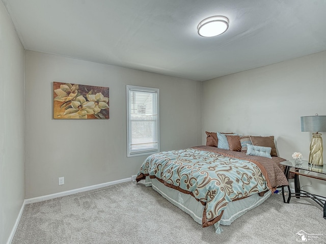 19106 Sylvia Ave, Romulus, MI 48174 - carpeted bedroom featuring baseboards