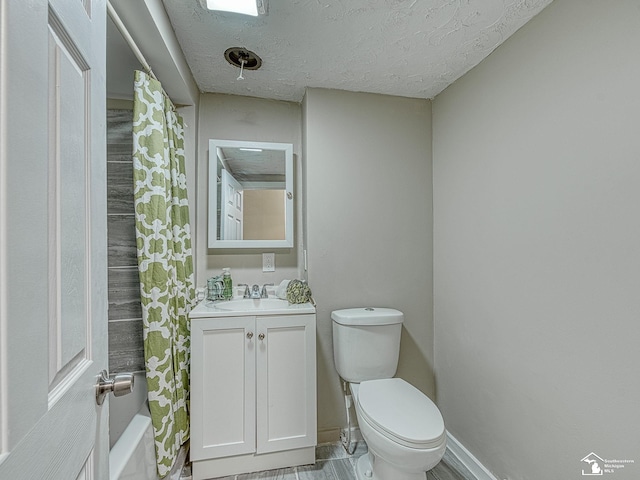 19106 Sylvia Ave, Romulus, MI 48174 - full bathroom featuring toilet, vanity, a textured ceiling, baseboards, and wood finished floors