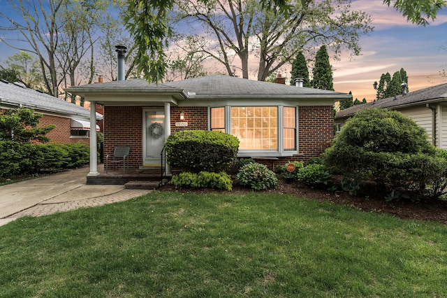 19150 Lexington, Redford, MI 48240 - view of front of house featuring a front yard and brick siding