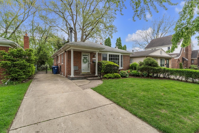 19150 Lexington, Redford, MI 48240 - bungalow-style house featuring brick siding, a gate, and driveway