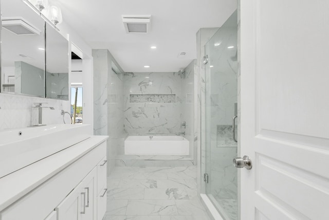 436 E Milwaukee St Unit 8, Detroit, MI 48202 - full bathroom with marble look tiles, a marble finish shower, vanity, recessed lighting, and a tub with marble appearance