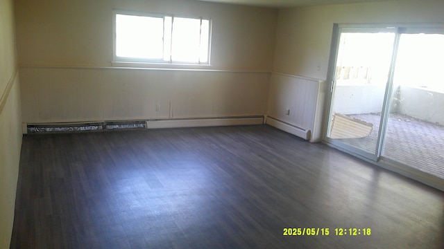 8240 Hampton Rd, Grosse Ile, MI 48138 - empty room with a wainscoted wall and wood finished floors