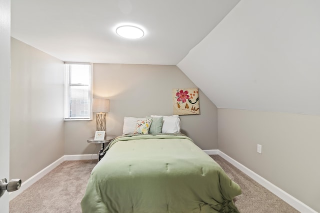 532 Chestnut St, Wyandotte, MI 48192 - bedroom featuring carpet flooring, baseboards, and vaulted ceiling