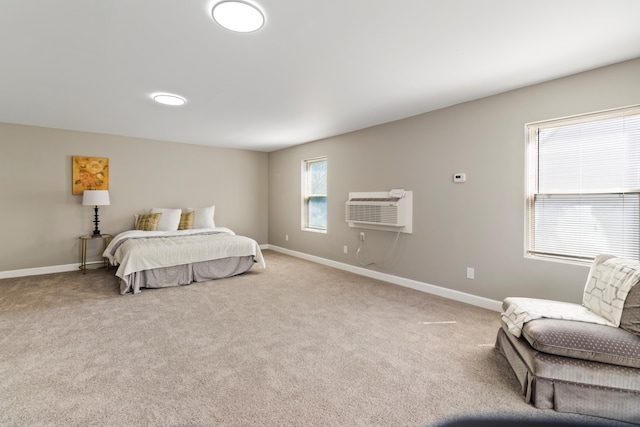 532 Chestnut St, Wyandotte, MI 48192 - bedroom with an AC wall unit, baseboards, and carpet