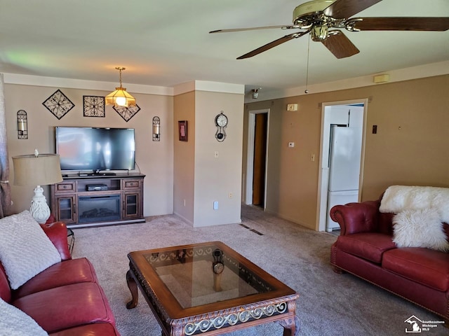 14815 Morris Ave, Allen Park, MI 48101 - living room featuring carpet, ceiling fan, and a glass covered fireplace
