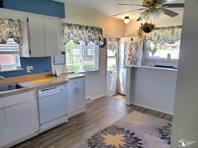 14815 Morris Ave, Allen Park, MI 48101 - kitchen with dishwasher, a sink, dark wood-style flooring, a ceiling fan, and white cabinetry