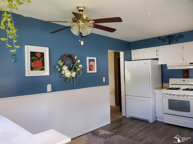 14815 Morris Ave, Allen Park, MI 48101 - kitchen featuring white appliances, under cabinet range hood, dark wood-style floors, ceiling fan, and wainscoting