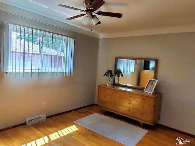14815 Morris Ave, Allen Park, MI 48101 - bedroom with wood finished floors, baseboards, and a ceiling fan