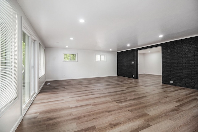16114 Alpine Dr, Livonia, MI 48154 - unfurnished living room featuring recessed lighting, light wood-style floors, and baseboards