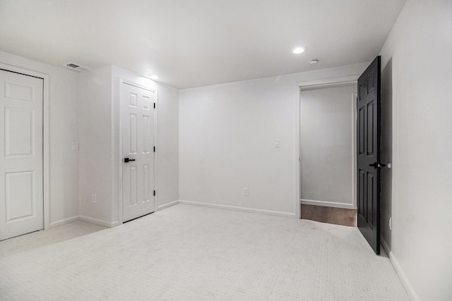 16114 Alpine Dr, Livonia, MI 48154 - unfurnished bedroom with carpet, baseboards, and recessed lighting