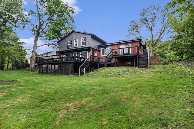 16114 Alpine Dr, Livonia, MI 48154 - back of property with stairway, a wooden deck, a yard, and brick siding