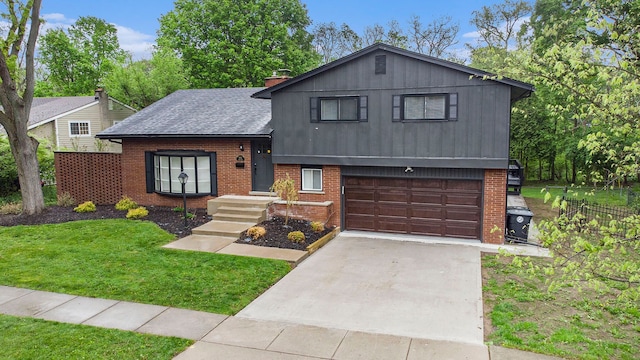 16114 Alpine Dr, Livonia, MI 48154 - tri-level home with a garage, brick siding, concrete driveway, and a shingled roof