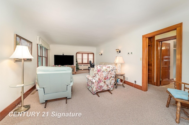 9610 Saginaw St, Reese, MI 48757 - living room with carpet flooring, radiator heating unit, and baseboards