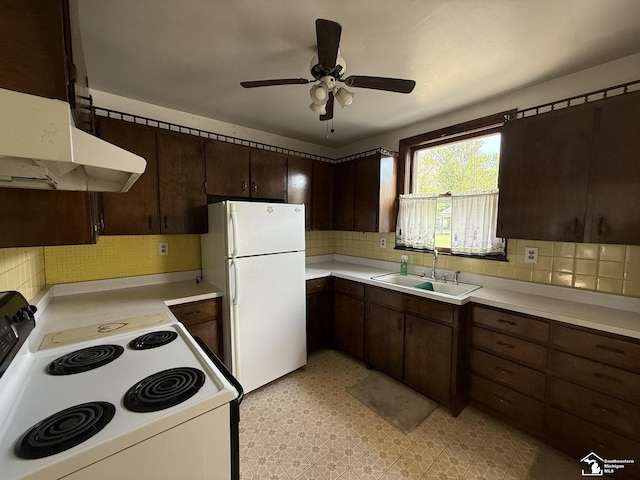 4971 Elm St, Newport, MI 48166 - kitchen featuring white appliances, a sink, light countertops, and ceiling fan