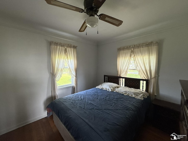 4971 Elm St, Newport, MI 48166 - bedroom with wood finished floors, baseboards, a ceiling fan, and crown molding