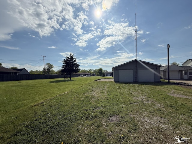 4971 Elm St, Newport, MI 48166 - view of yard with a detached garage and an outbuilding