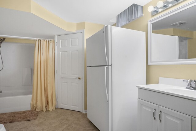 1663 Tacoma Dr, Rochester Hills, MI 48306 - bathroom with vanity and shower / tub combo