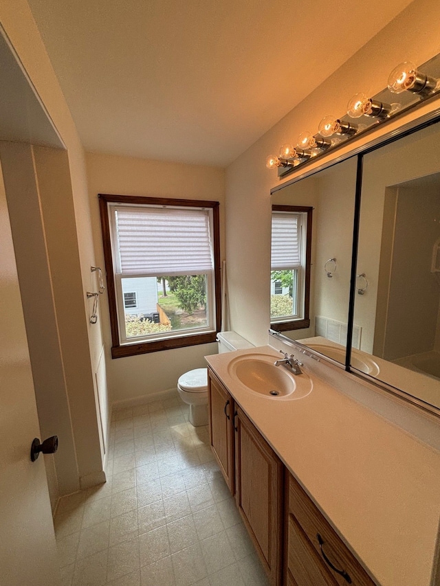 1163 Marquette Ct, Rochester Hills, MI 48307 - bathroom featuring toilet, tile patterned floors, and vanity